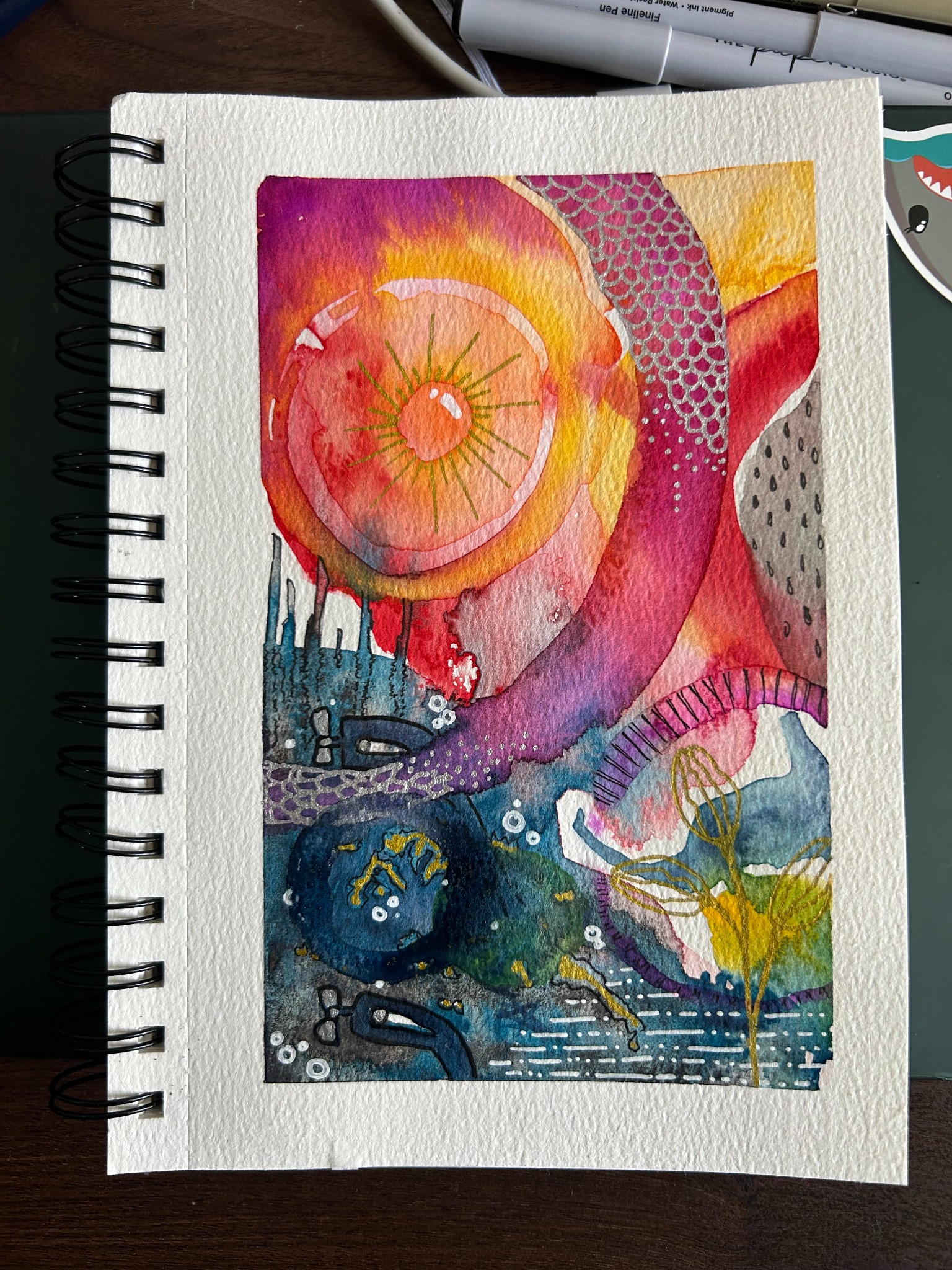 Pink, yellow and blue abstract sketchbook scene with circular form and submarine-like shapes